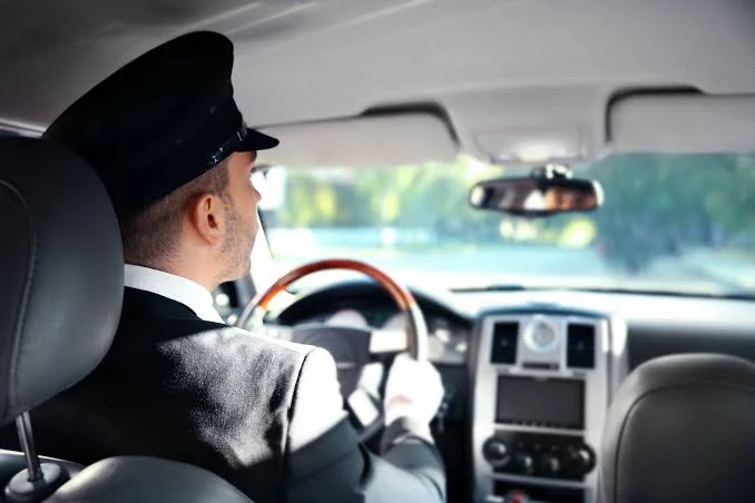 Professional chauffeur providing private transportation service Professional chauffeur providing private transportation service